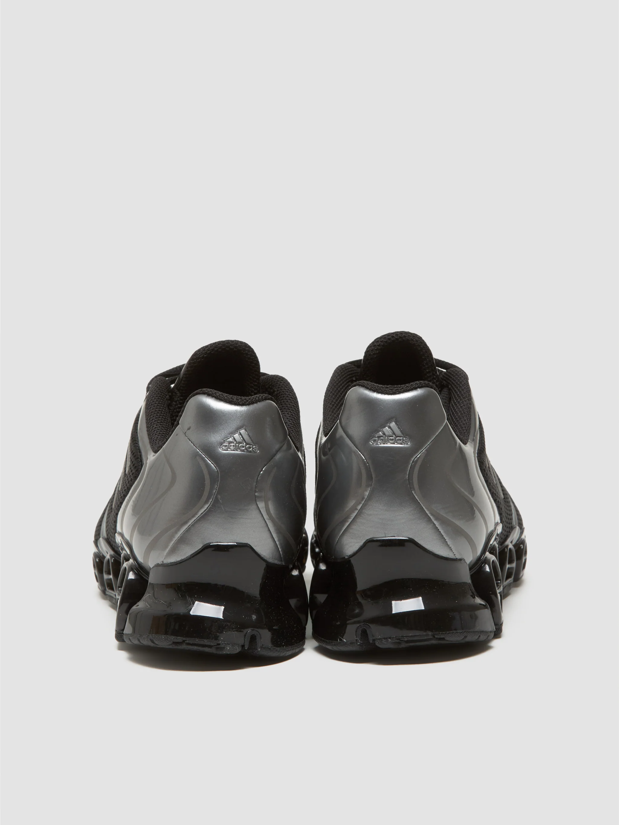 WMNS Mega Ghostride Sneaker in Black & Iron Metallic - Image 4