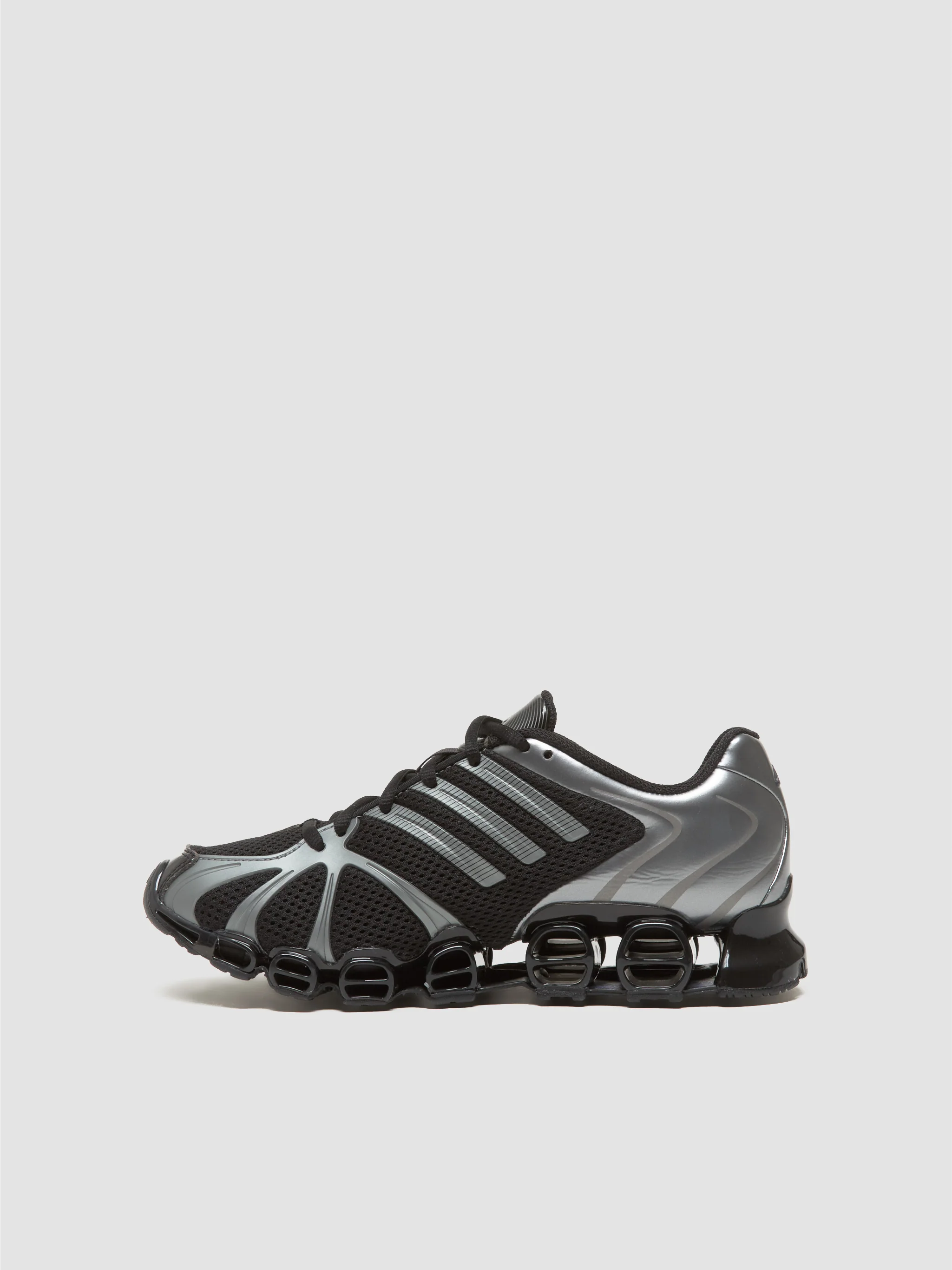 WMNS Mega Ghostride Sneaker in Black & Iron Metallic - Image 6