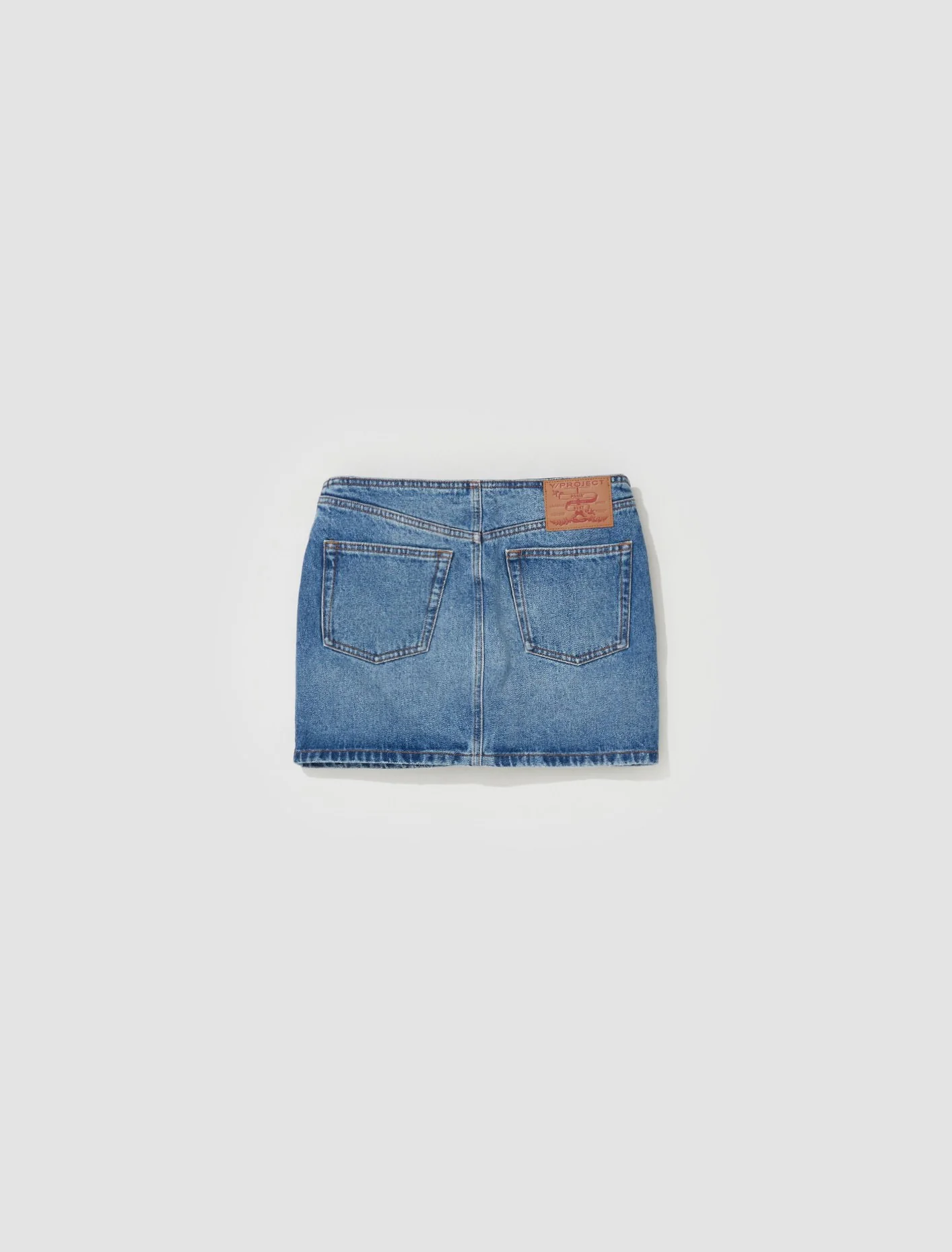 Y Belt Arc Denim Mini Skirt in Faded Blue - Image 4